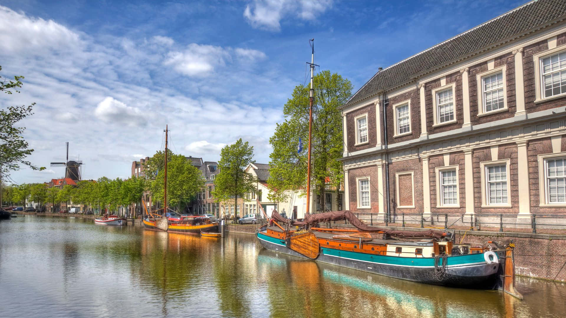 Schiedam Canal Viewwith Windmilland Boats Wallpaper