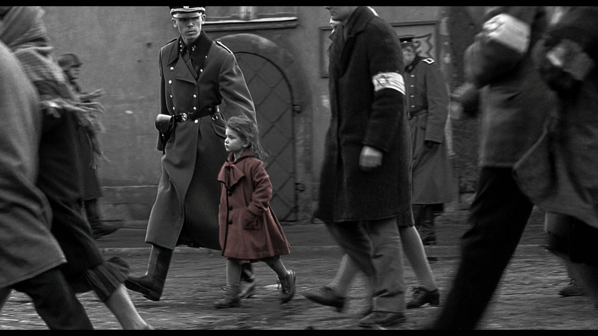 Schindler's List Girl In Red Coat Walking Wallpaper