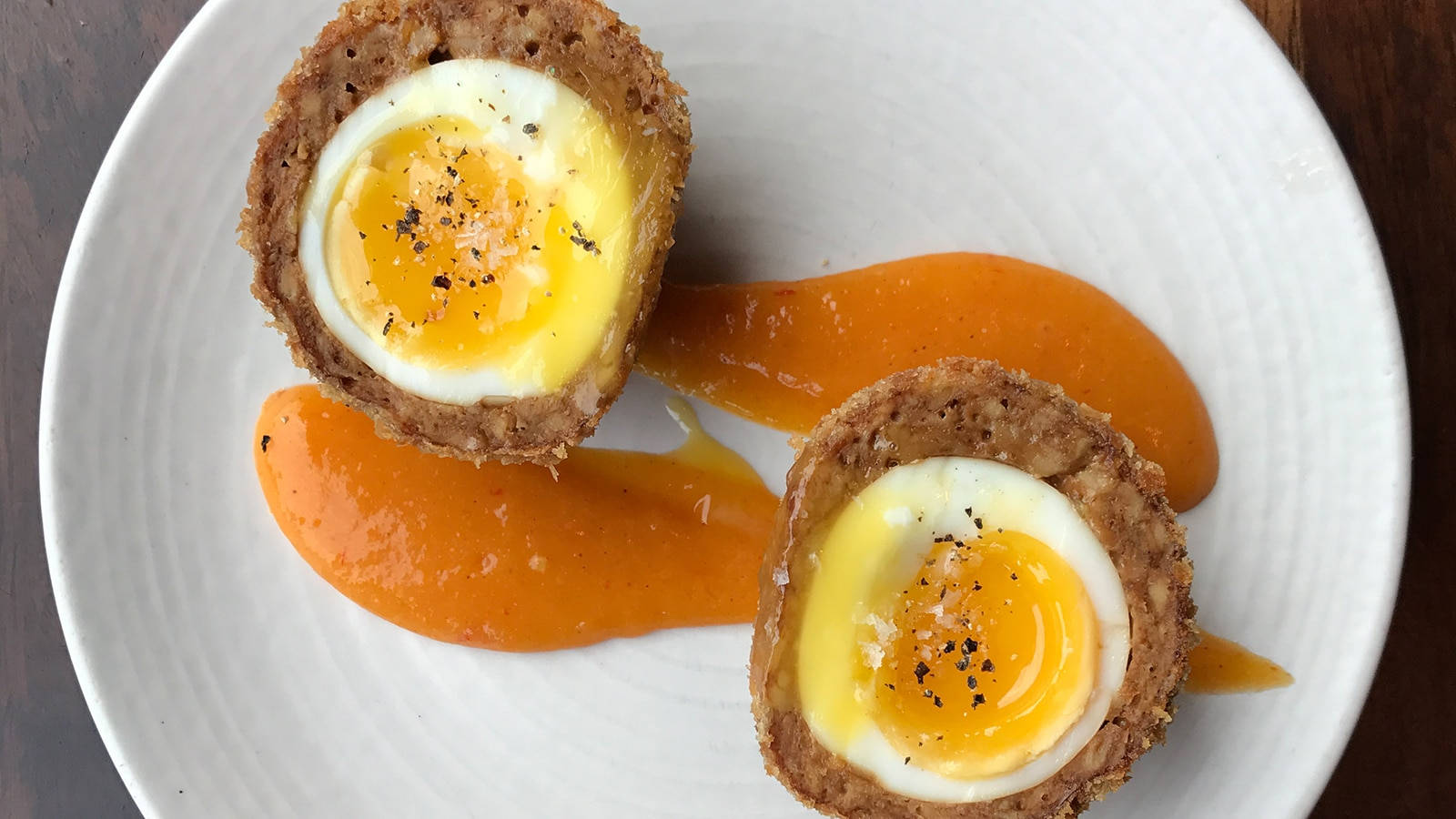Scotch Eggs Dish With Mustard And Pepper Wallpaper