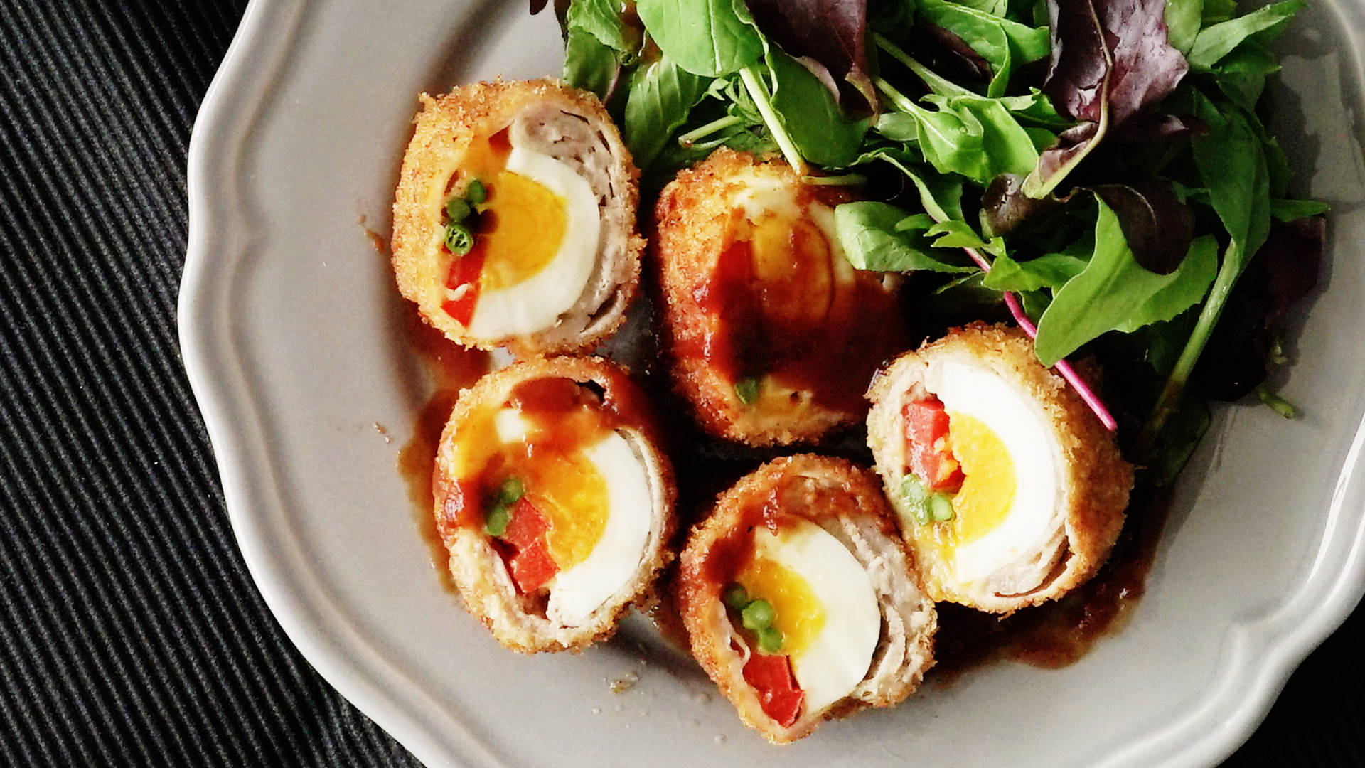 Scotch Eggs With Vegetables And Red Sauce Wallpaper