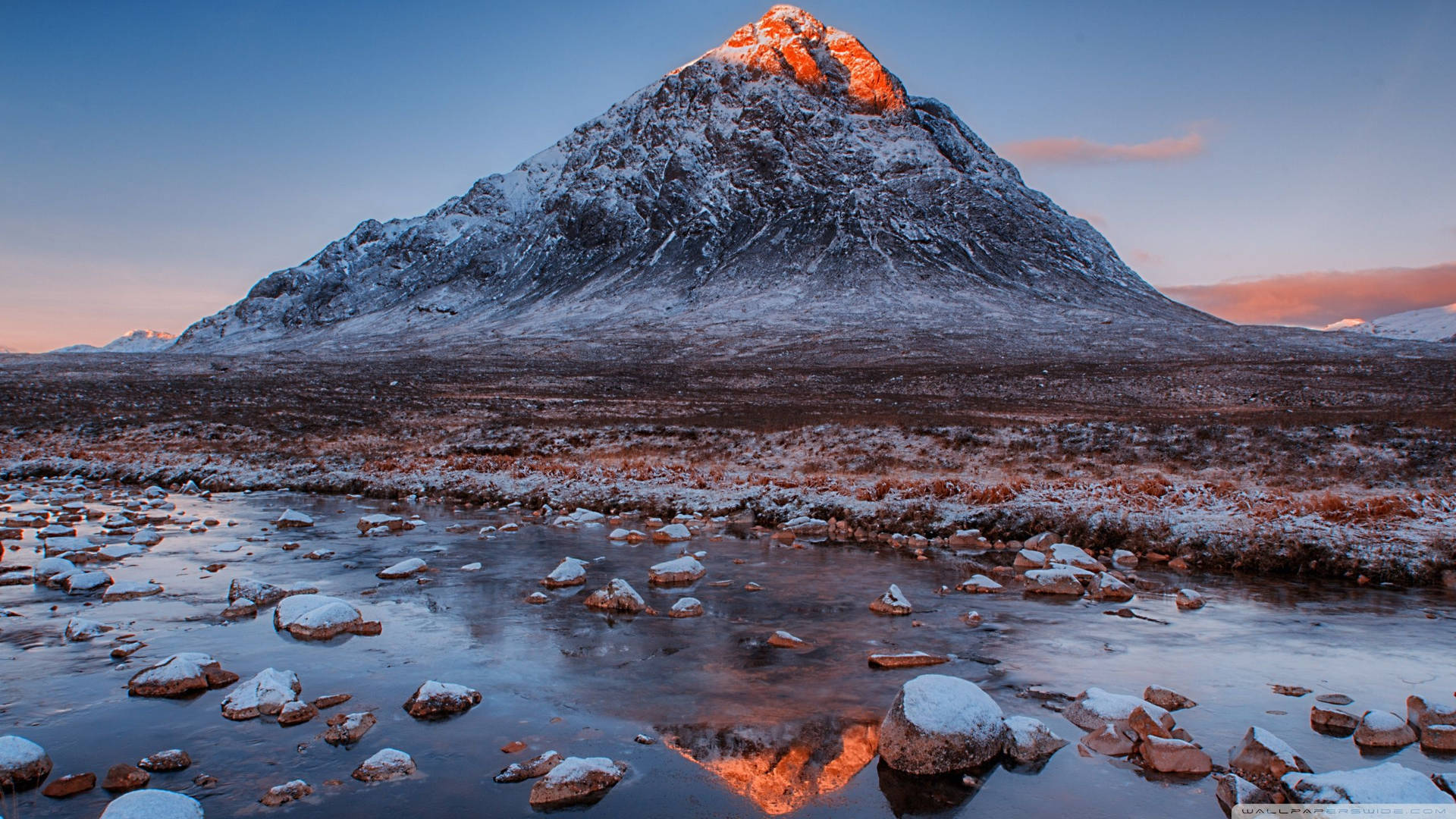 Enjoy the Vast Orange Tones of Scotland's Peaks Wallpaper