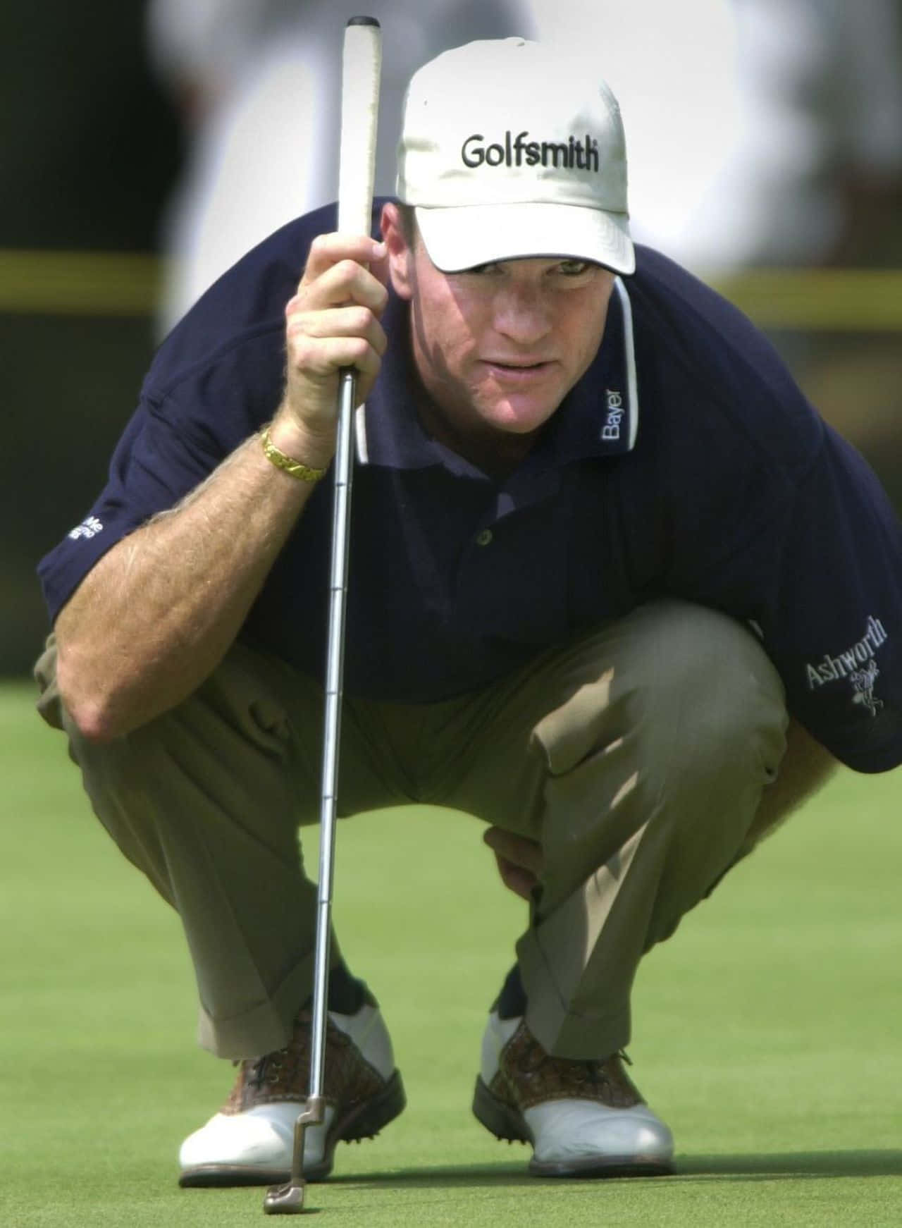 Veteran golfer Scott Verplank assessing the course Wallpaper