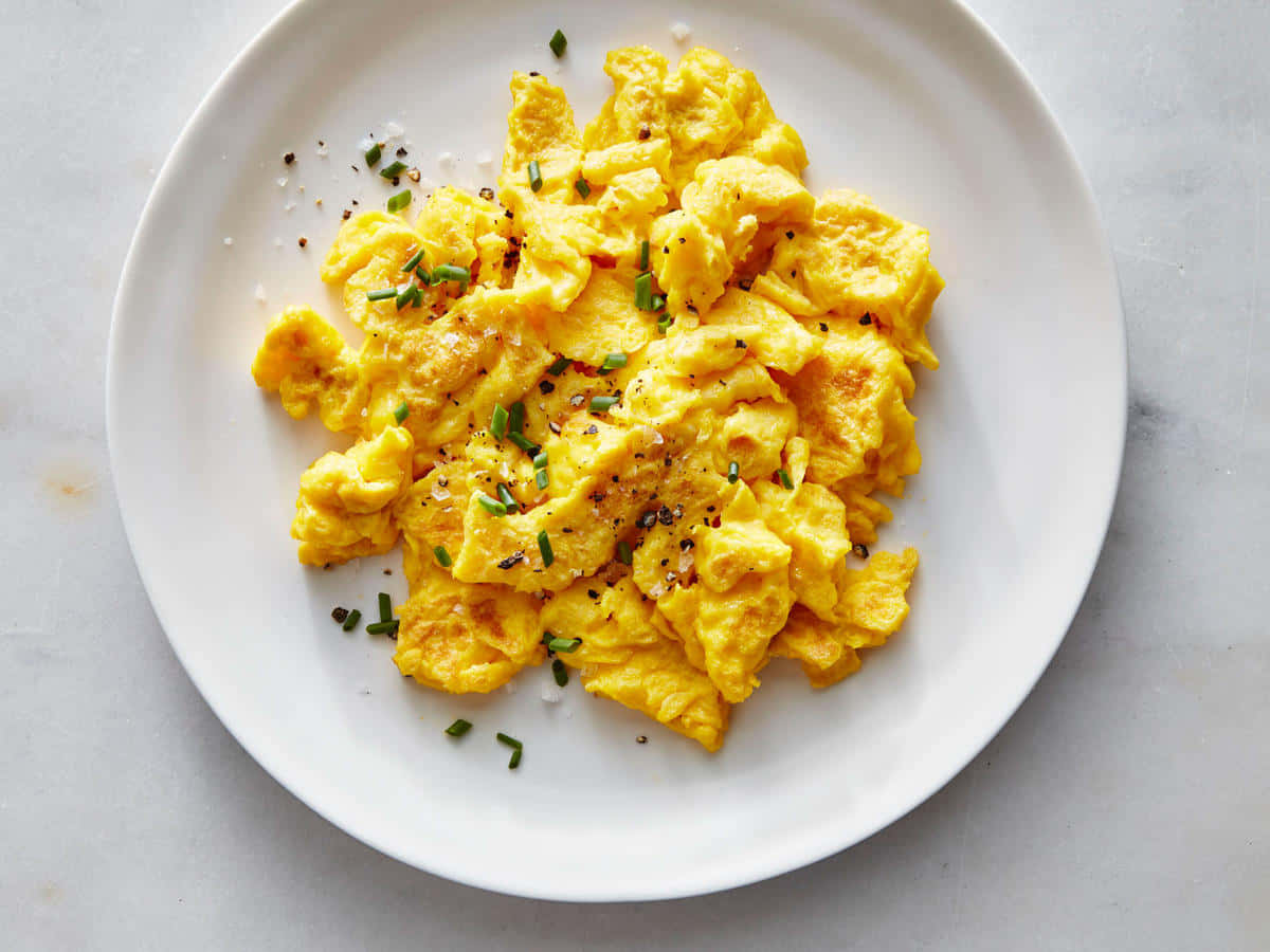 Start your morning off right with this balanced breakfast of scrambled egg!