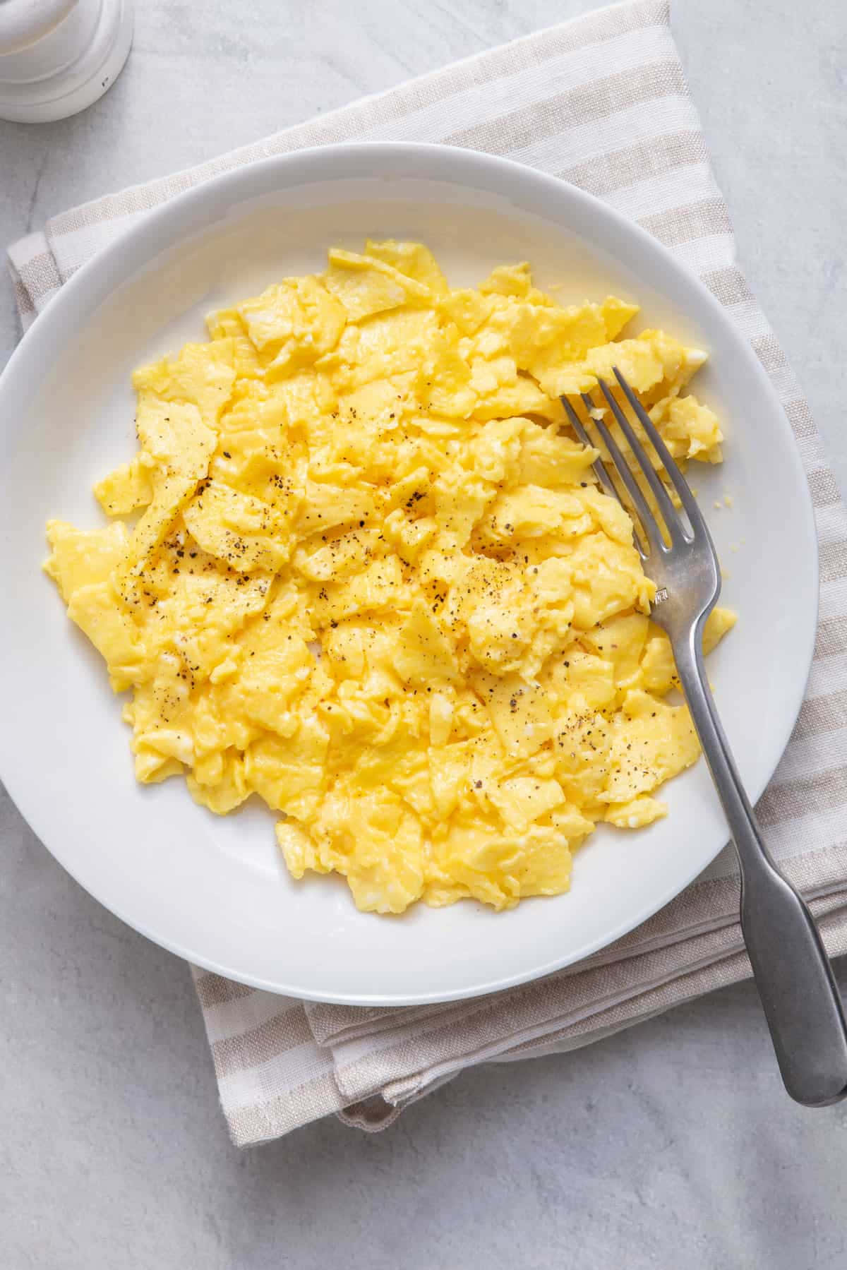 A plate of freshly cooked scrabbled eggs
