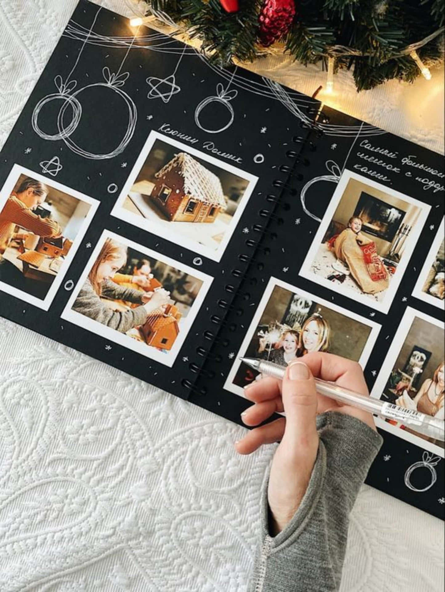 A Person Is Taking Photos In A Black Photo Book