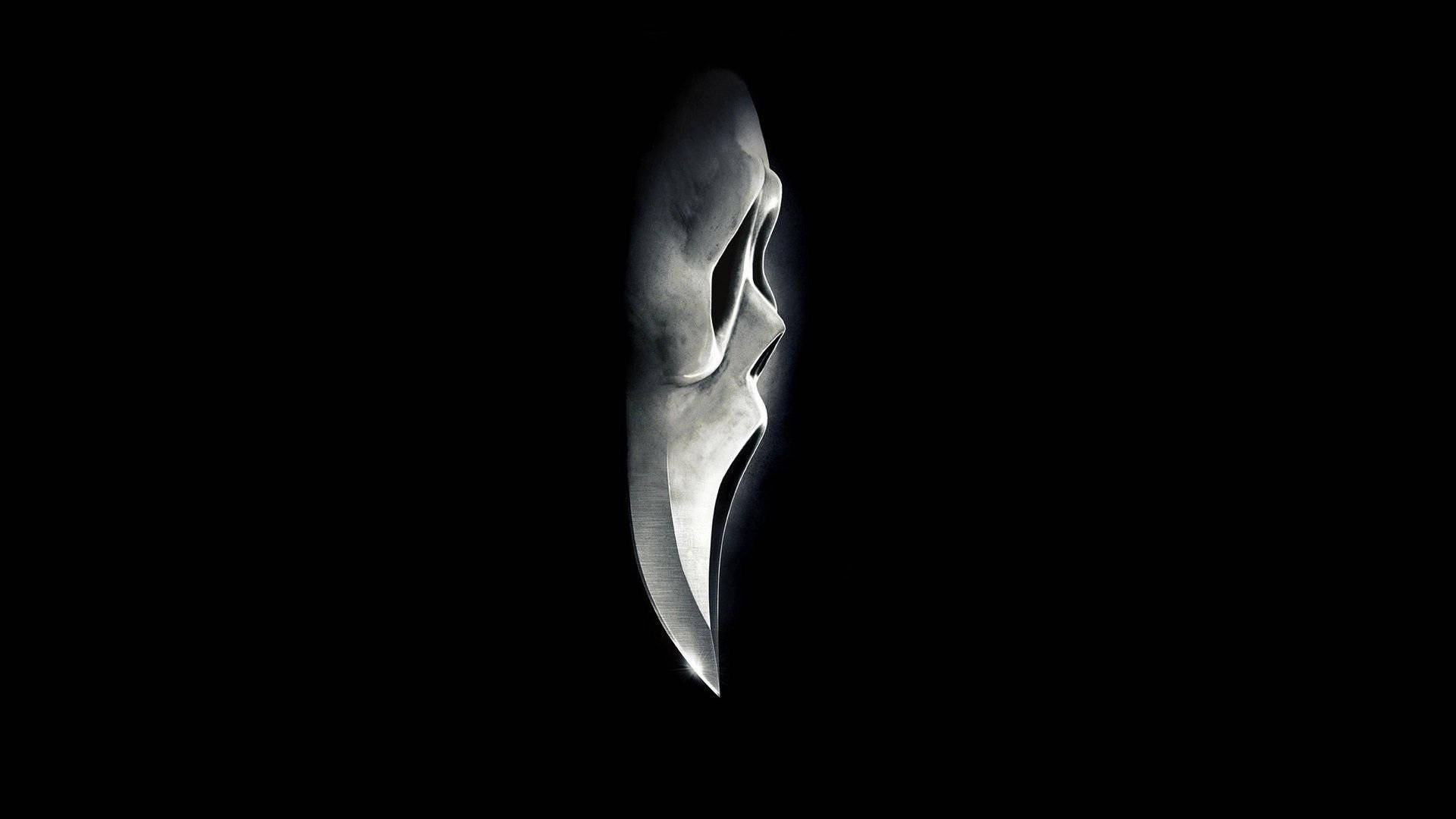 Fear Strikes Deep - The Infamous Ghostface from the Scream Series Wallpaper