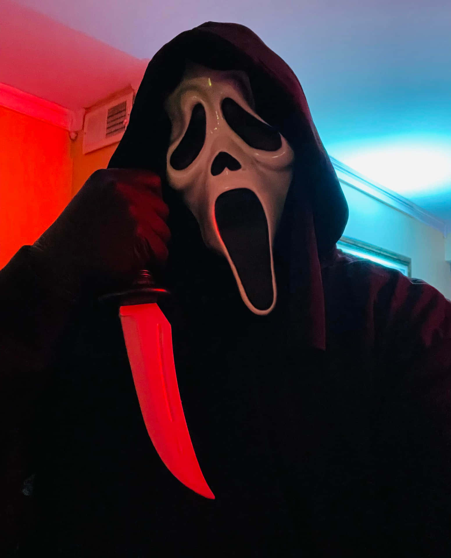 Scream Masked Figurewith Knife Wallpaper