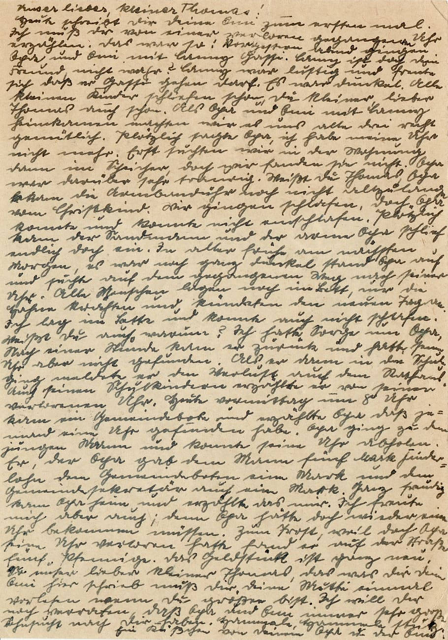 Caption: Elegant script handwritten with black ink. Wallpaper