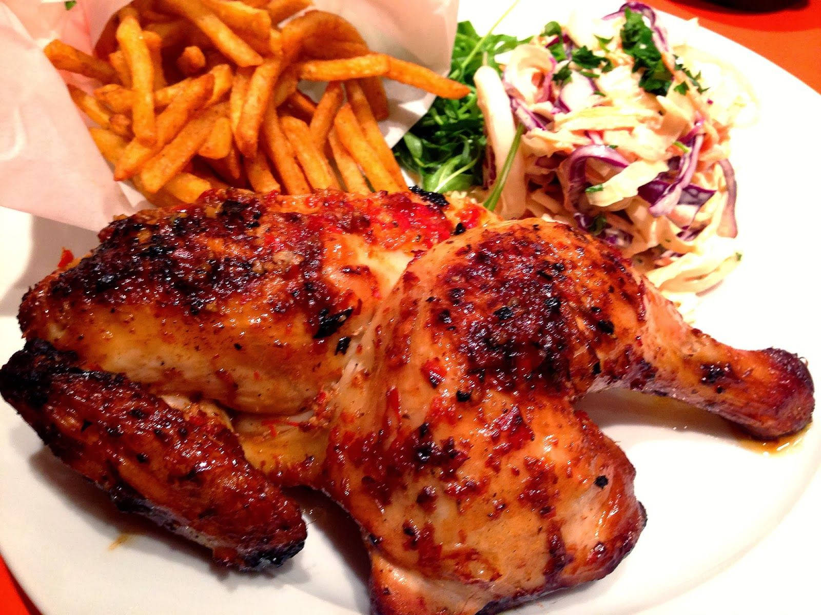 Scrumptious Peri Peri Chicken With Coleslaw And Fries Wallpaper