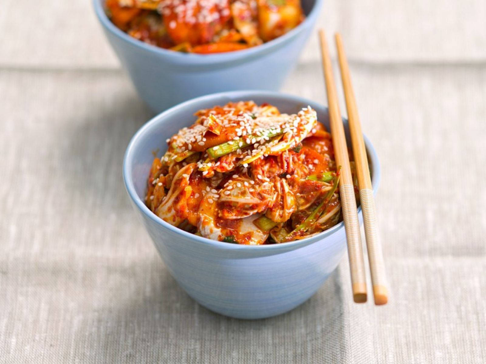 Vibrant and Scrumptious Kimchi in a Blue Dish Wallpaper
