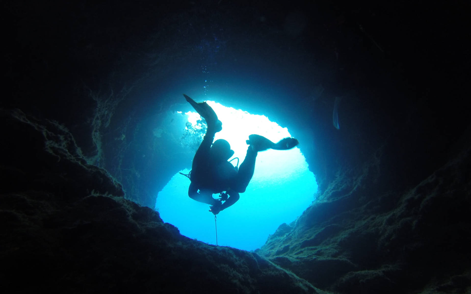 Scuba Diver Swimming Underwater Cave Wallpaper