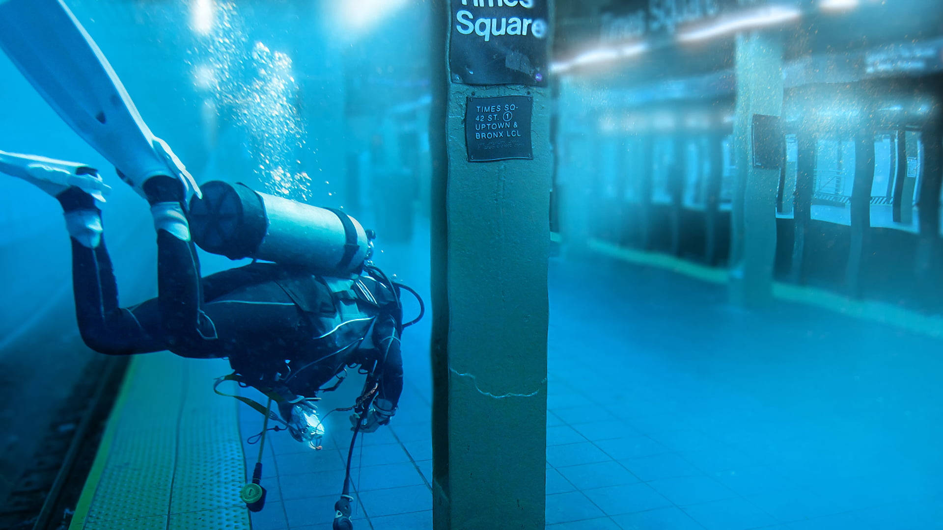 Dykning i oversvømmet metro Wallpaper