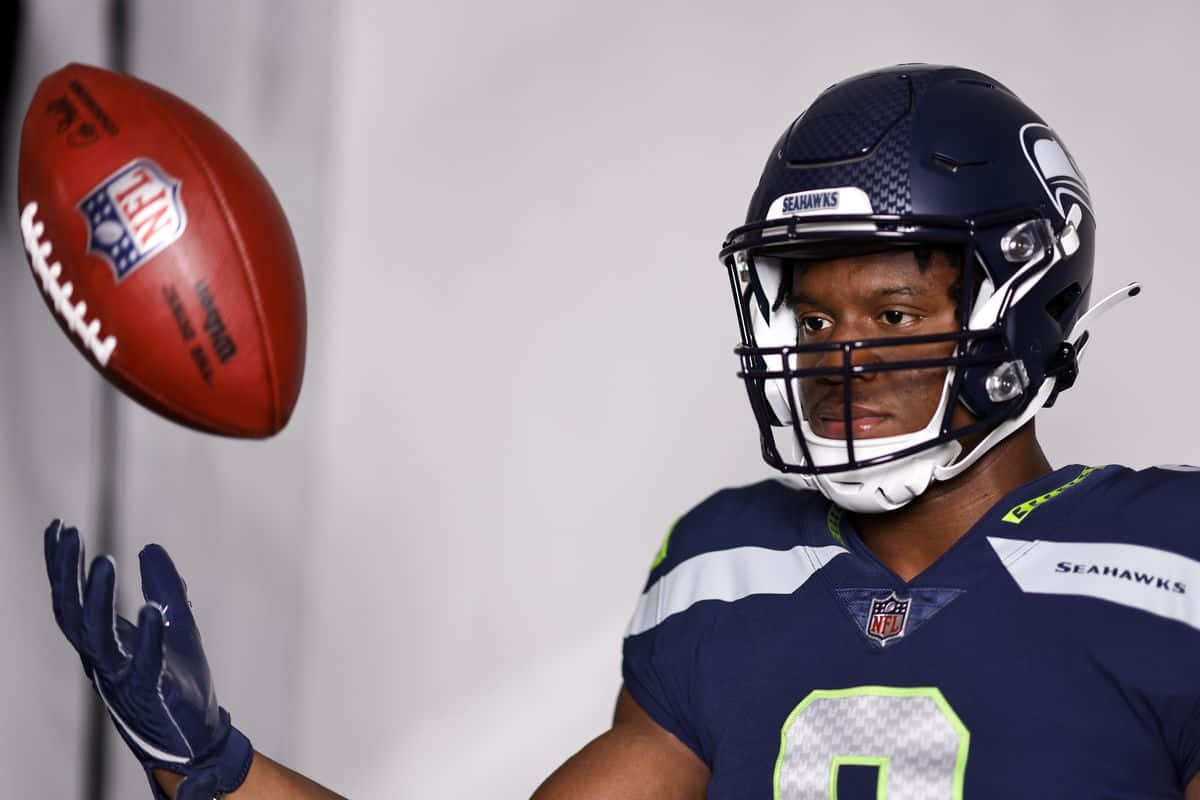 Seahawks Player Catching Football Wallpaper