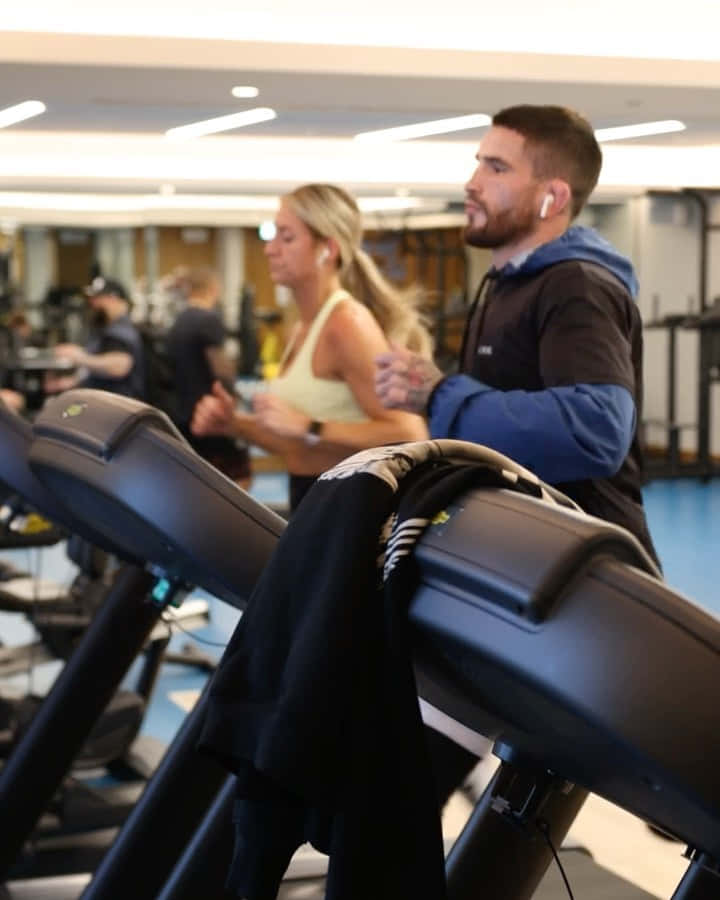 Sean Brady Running On Treadmill Background