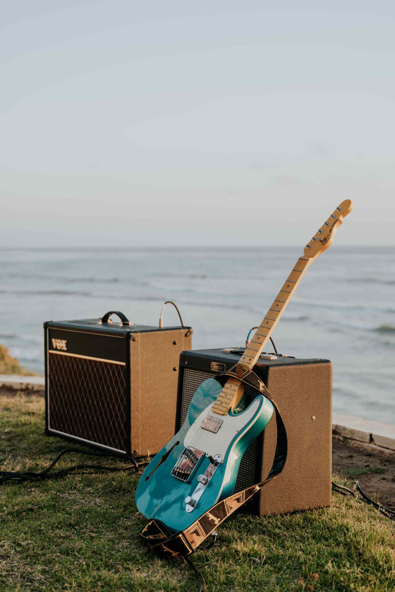 Seaside_ Electric_ Guitar_and_ Amplifier_ Setup Wallpaper