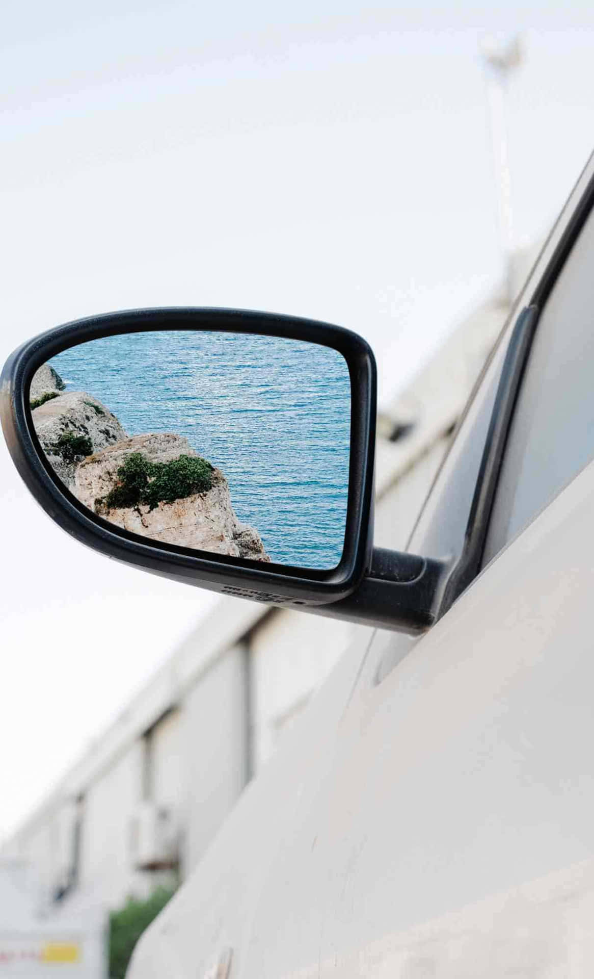 Seaside_ Reflection_in_ Car_ Mirror Wallpaper