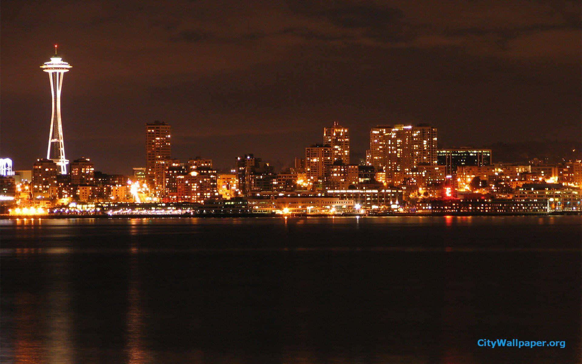 '¡laciudad De Seattle Ilumina El Cielo Nocturno!' Fondo de pantalla