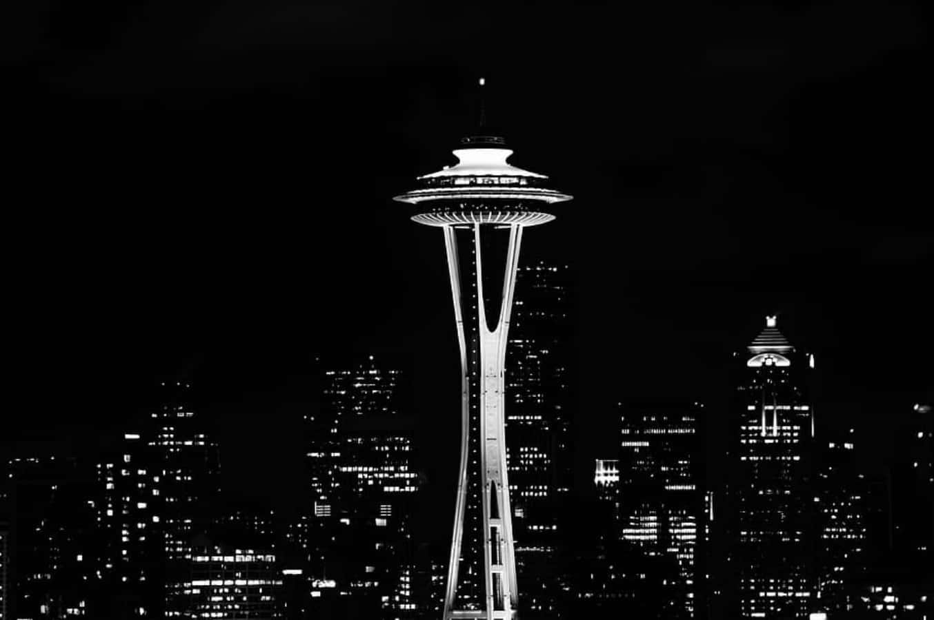 A Black And White Photo Of The Space Needle Wallpaper