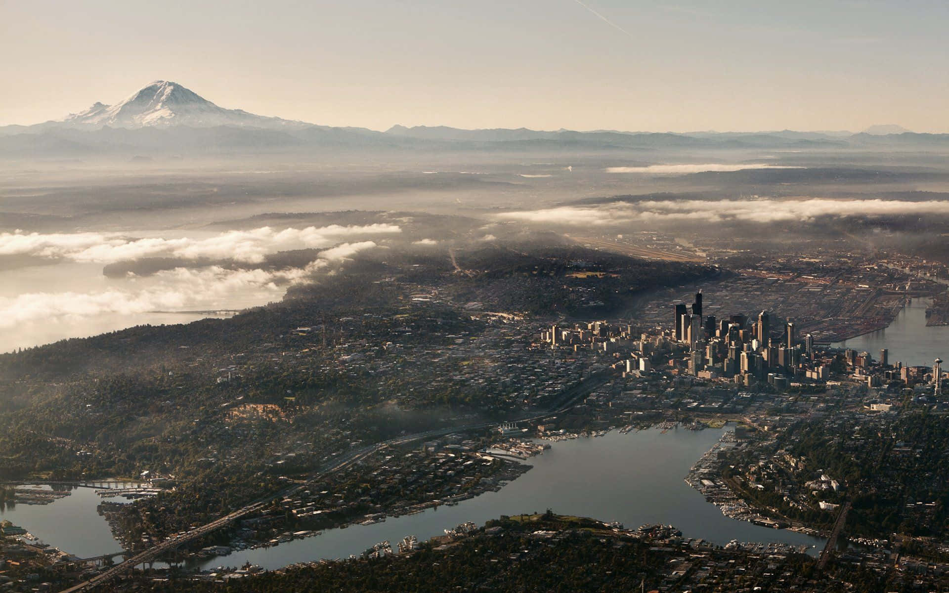 Enjoy the breathtaking skyline of Seattle at night Wallpaper