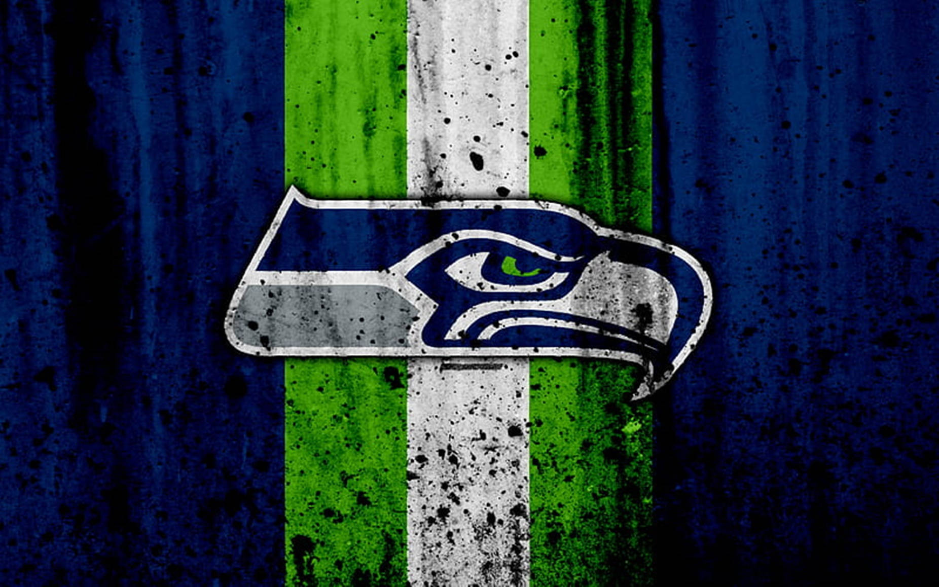 Logode Los Seattle Seahawks Con Salpicaduras De Pintura Negra. Fondo de pantalla