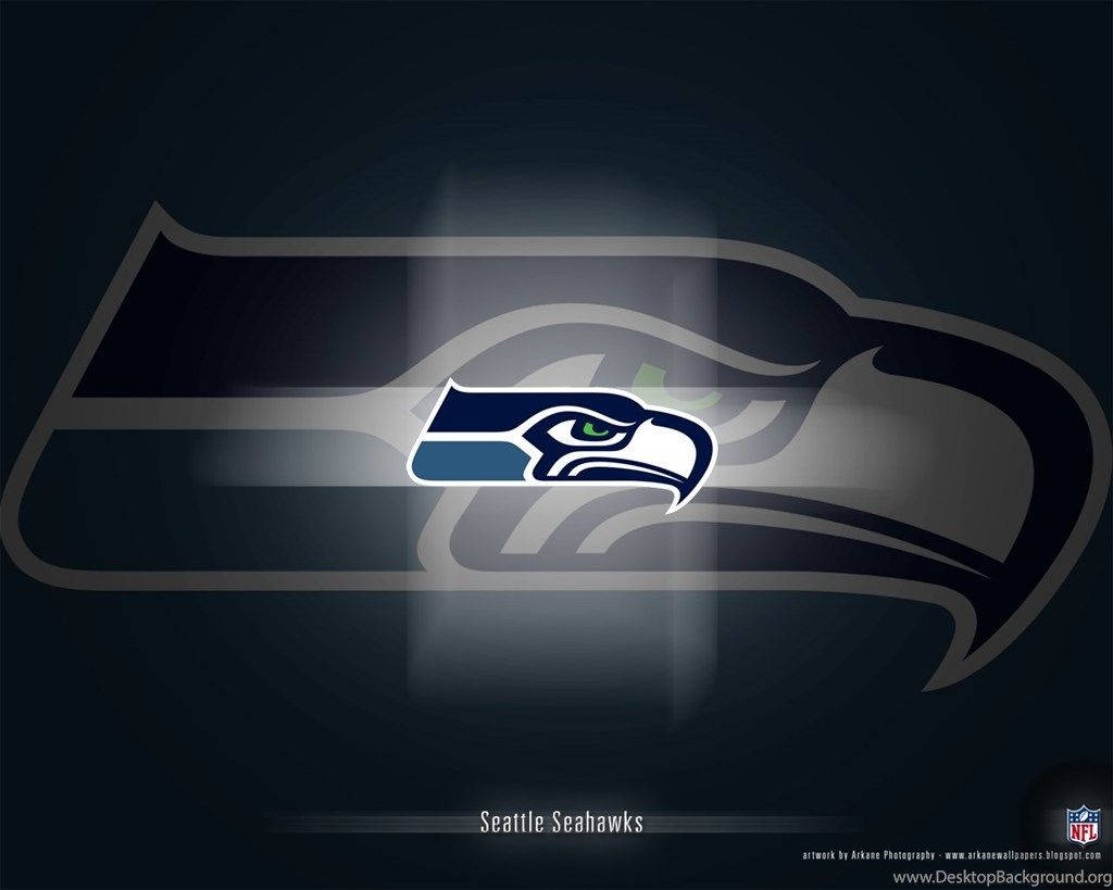 Representing Seattle: The Seattle Seahawks Ready For Action Wallpaper