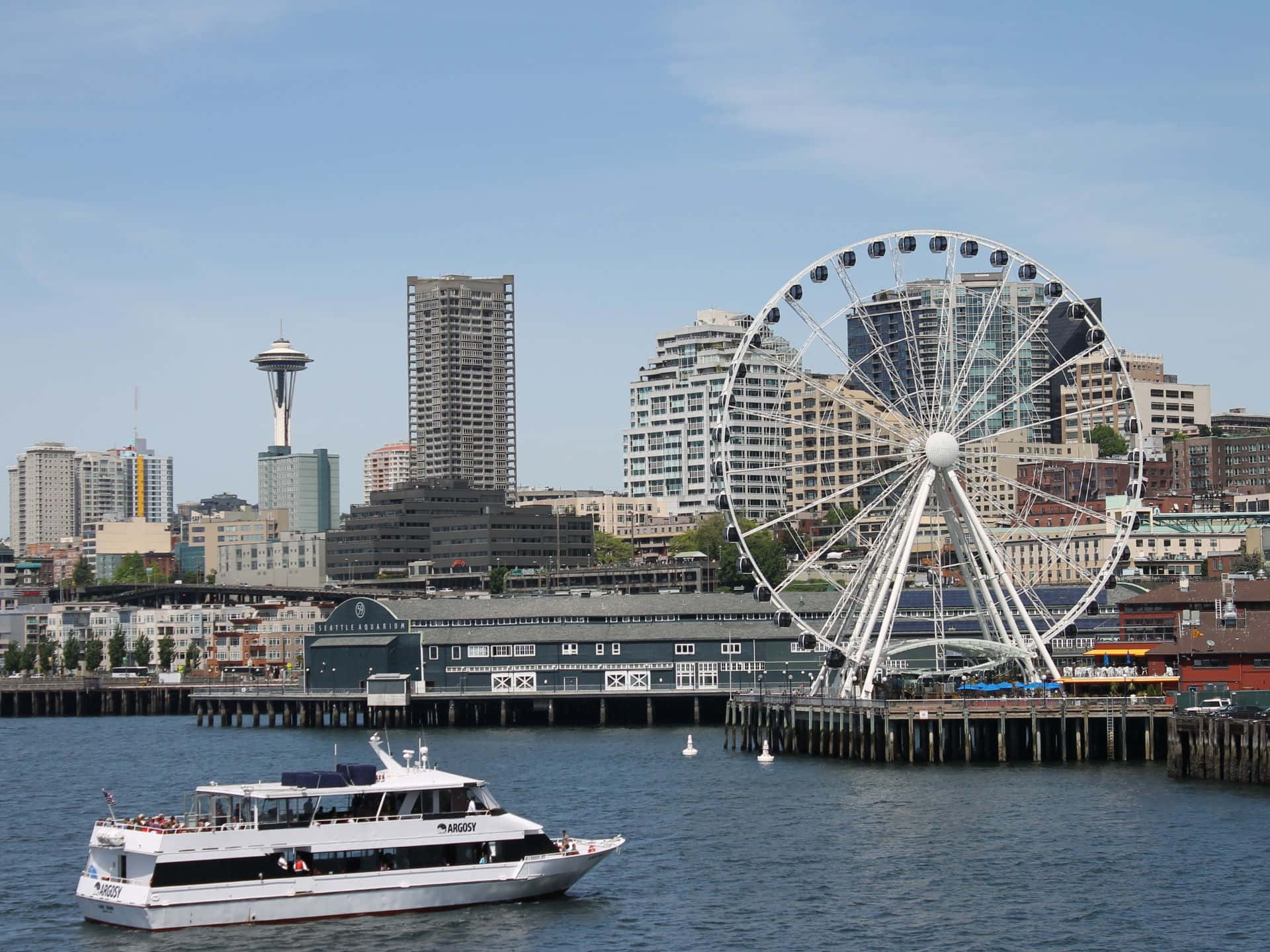 Seattle Waterfrontwith Ferris Wheeland Space Needle Wallpaper