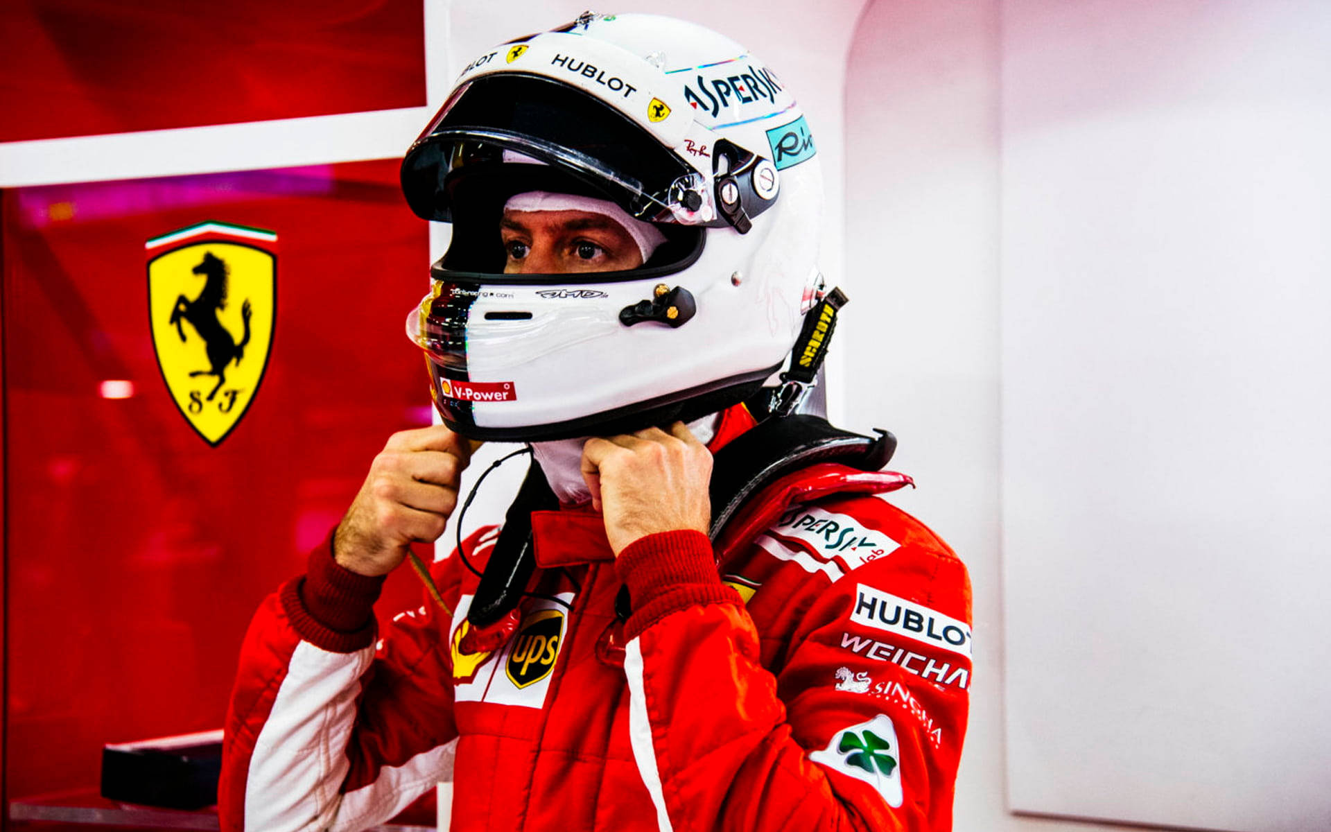 Sebastian Vettel In A Racing Suit Wallpaper
