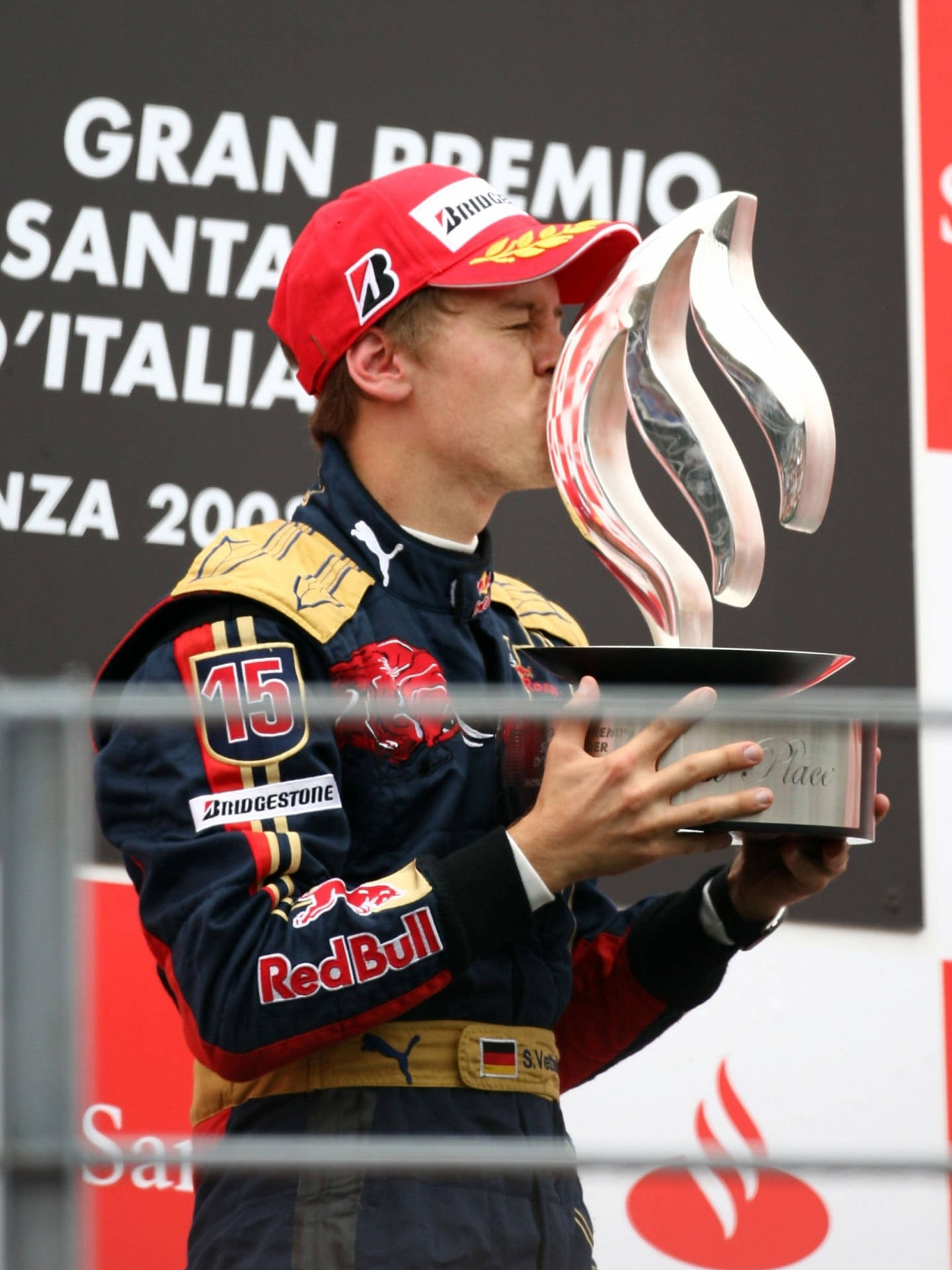 Sebastian Vettel Kissing The Trophy Wallpaper