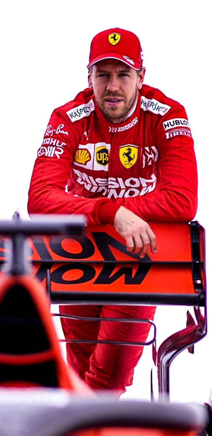 Sebastian Vettel Leaning On A Rail Wallpaper