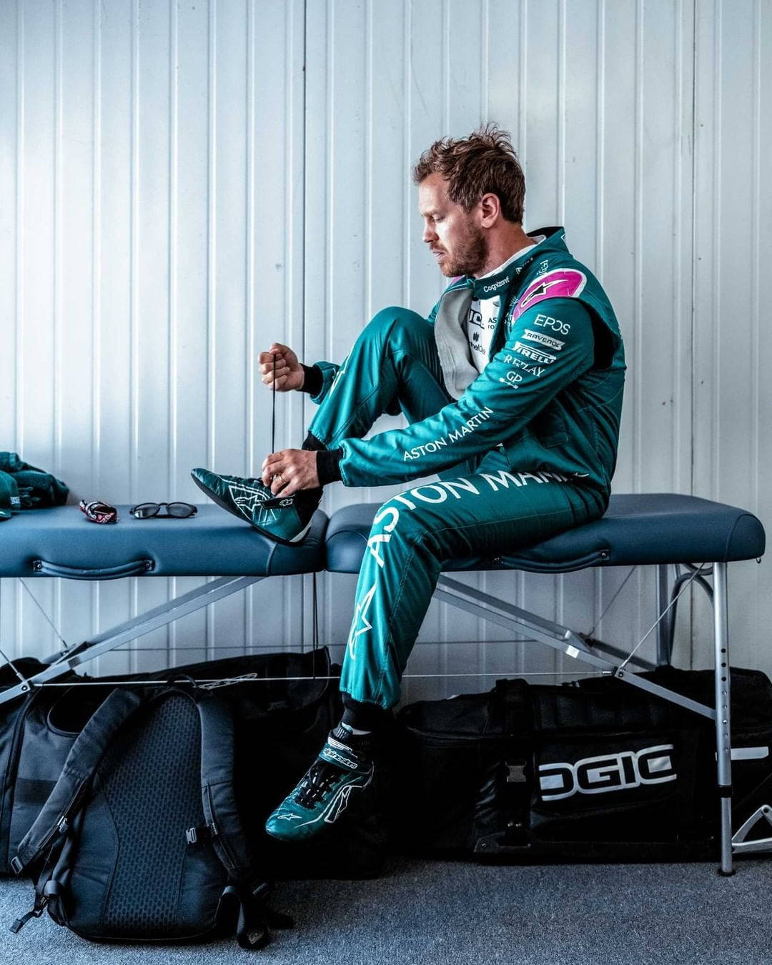 Sebastian Vettel Sitting On A Bench Wallpaper