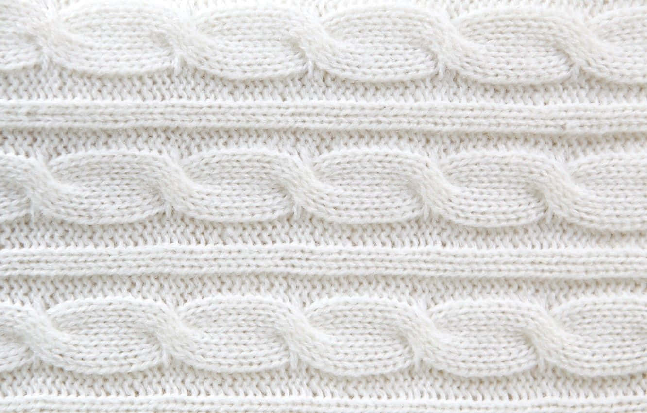 Section Of Tightly Knit White Sweater Wallpaper