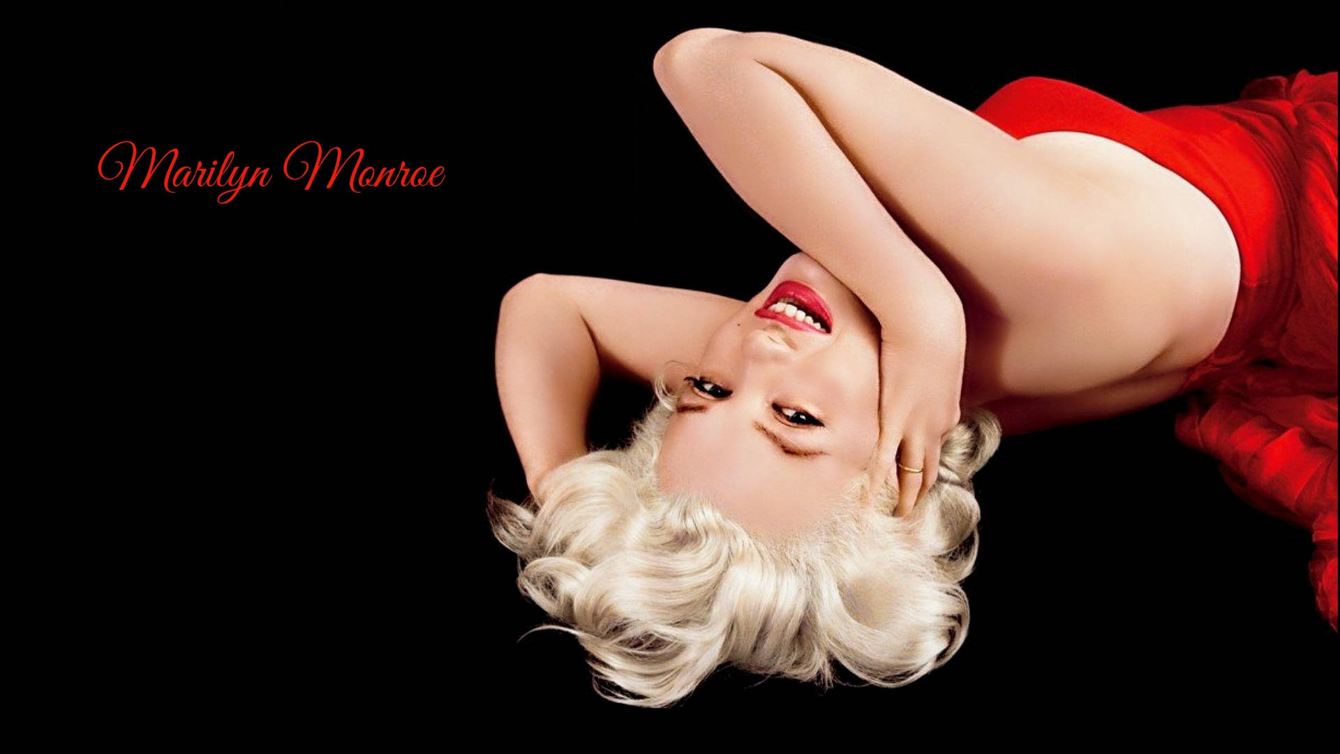 Sexet Marilyn Monroe i rød kjole Wallpaper