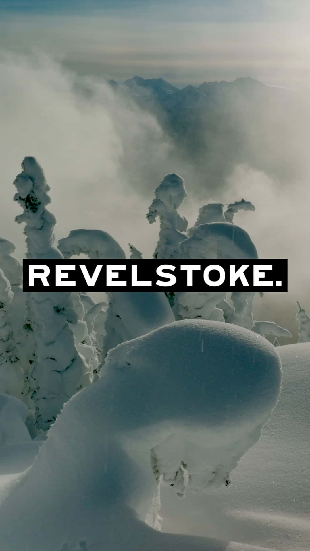 A Snow Covered Mountain With The Words Revelstoke Wallpaper