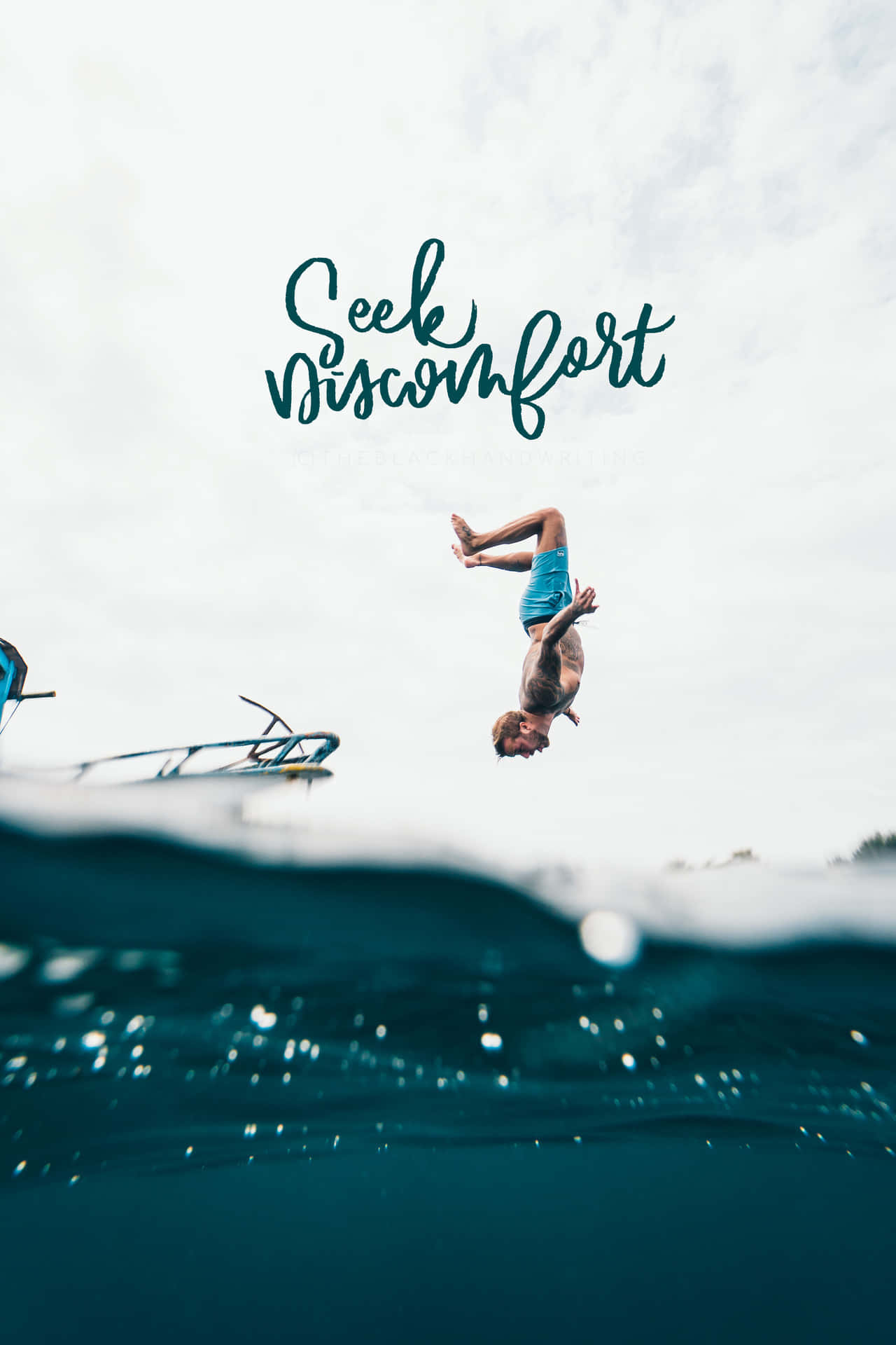 A Man Is Diving Into The Ocean With The Words Seek Visionfort Wallpaper