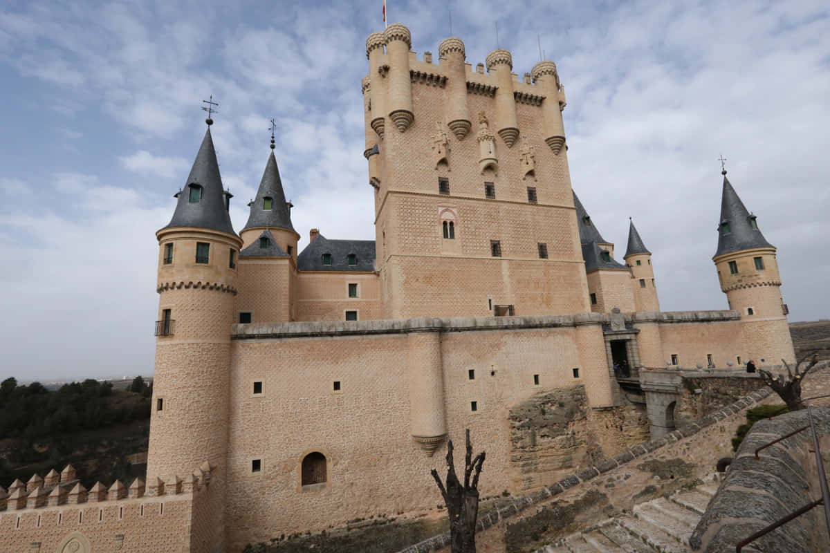 Segovia Castle Against Gloomy Sky Wallpaper