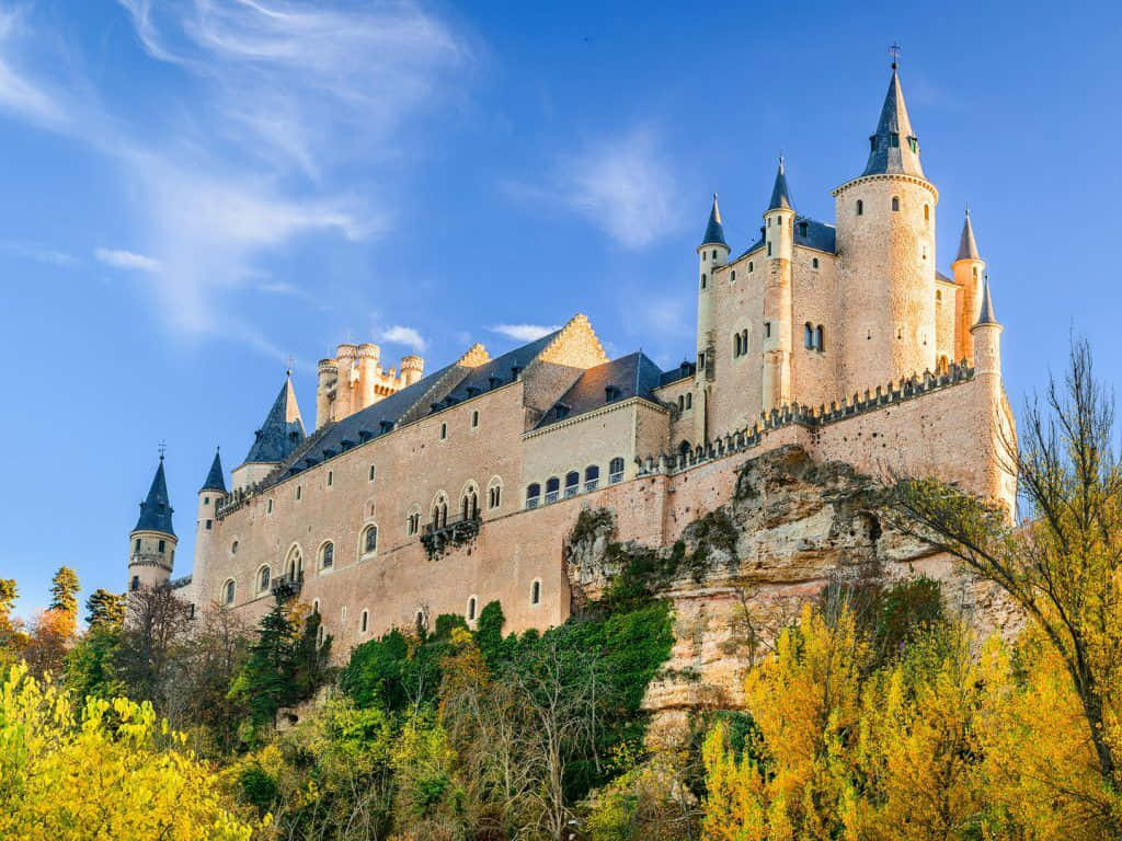 Segovia Castle Sitting On Rock Wallpaper