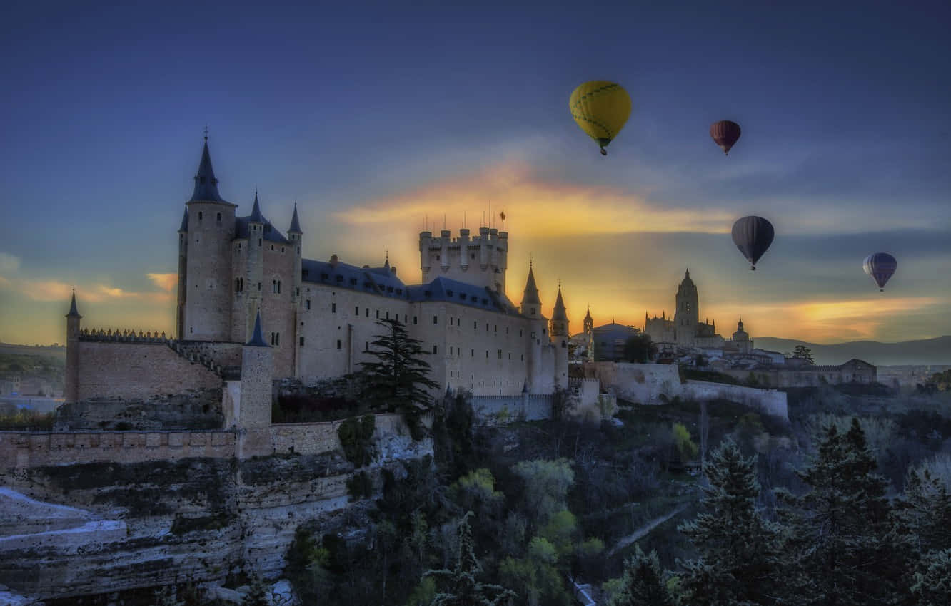 Segovia Castle With Hot Air Balloons Wallpaper