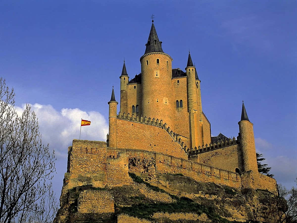 Segovia Castle With Spain Flag Wallpaper