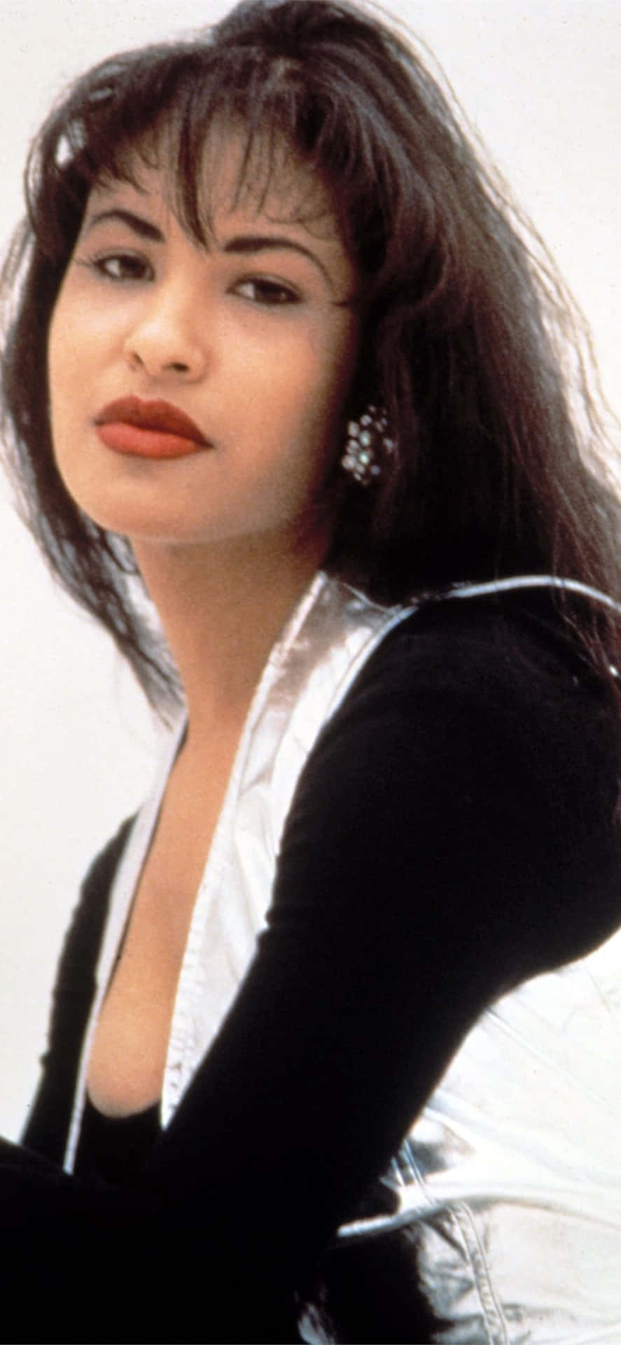 Vis din kærlighed til Selena Quintanilla med denne iPhone tapet. Wallpaper