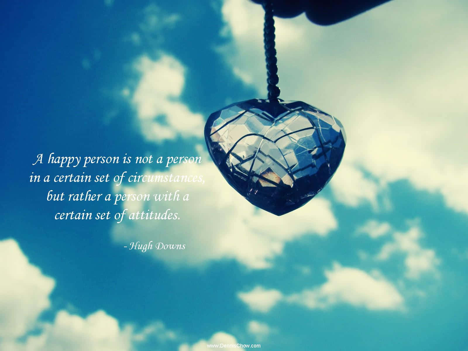 A Heart Hanging From A Necklace With A Quote Wallpaper