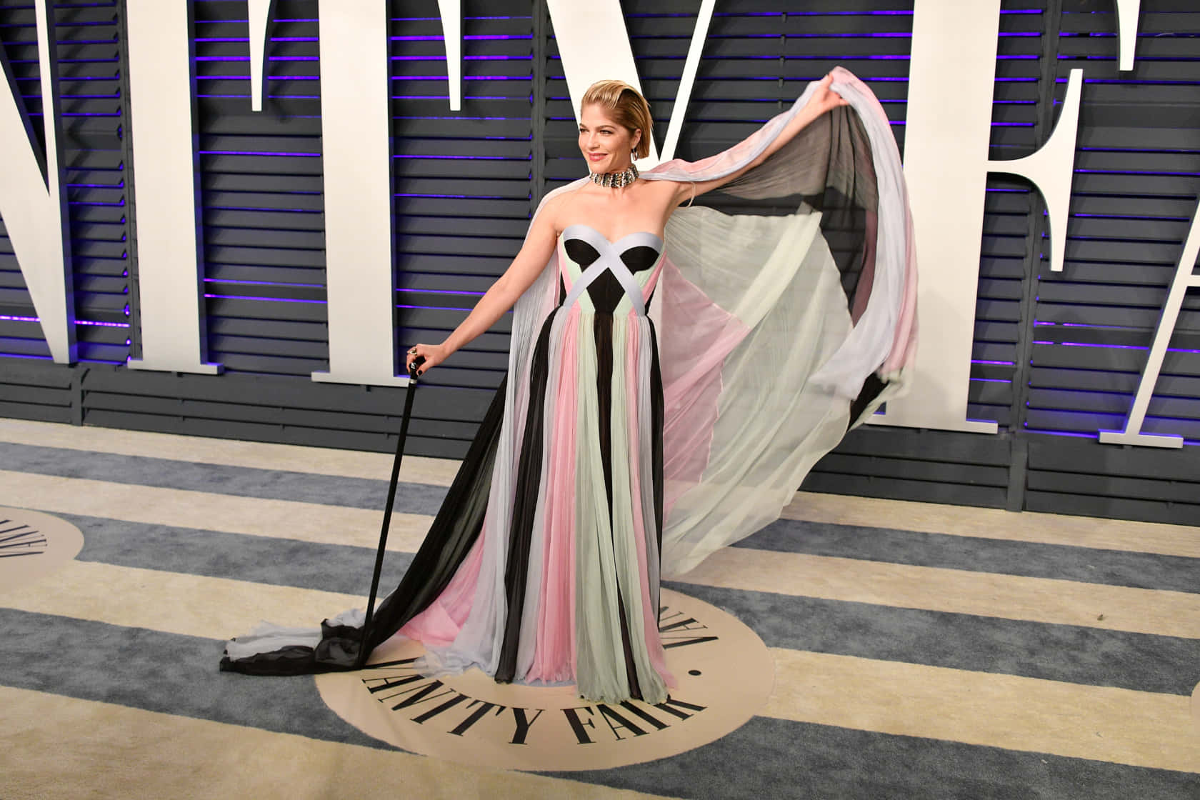 Selma Blair Posing Elegantly in a Stunning Gown Wallpaper