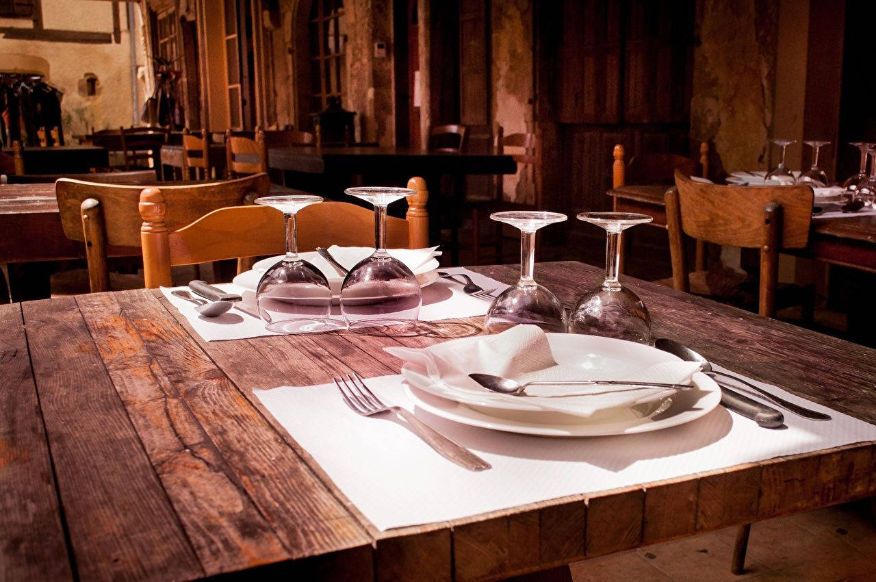 Semi Formal Table Setting In A Restaurant Wallpaper