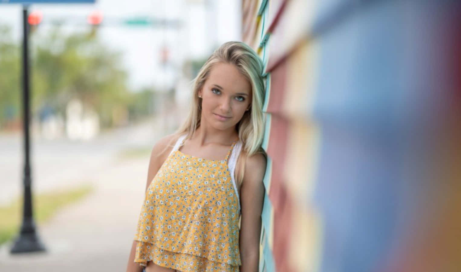 Senior Blonde Girl On Wall Pictures