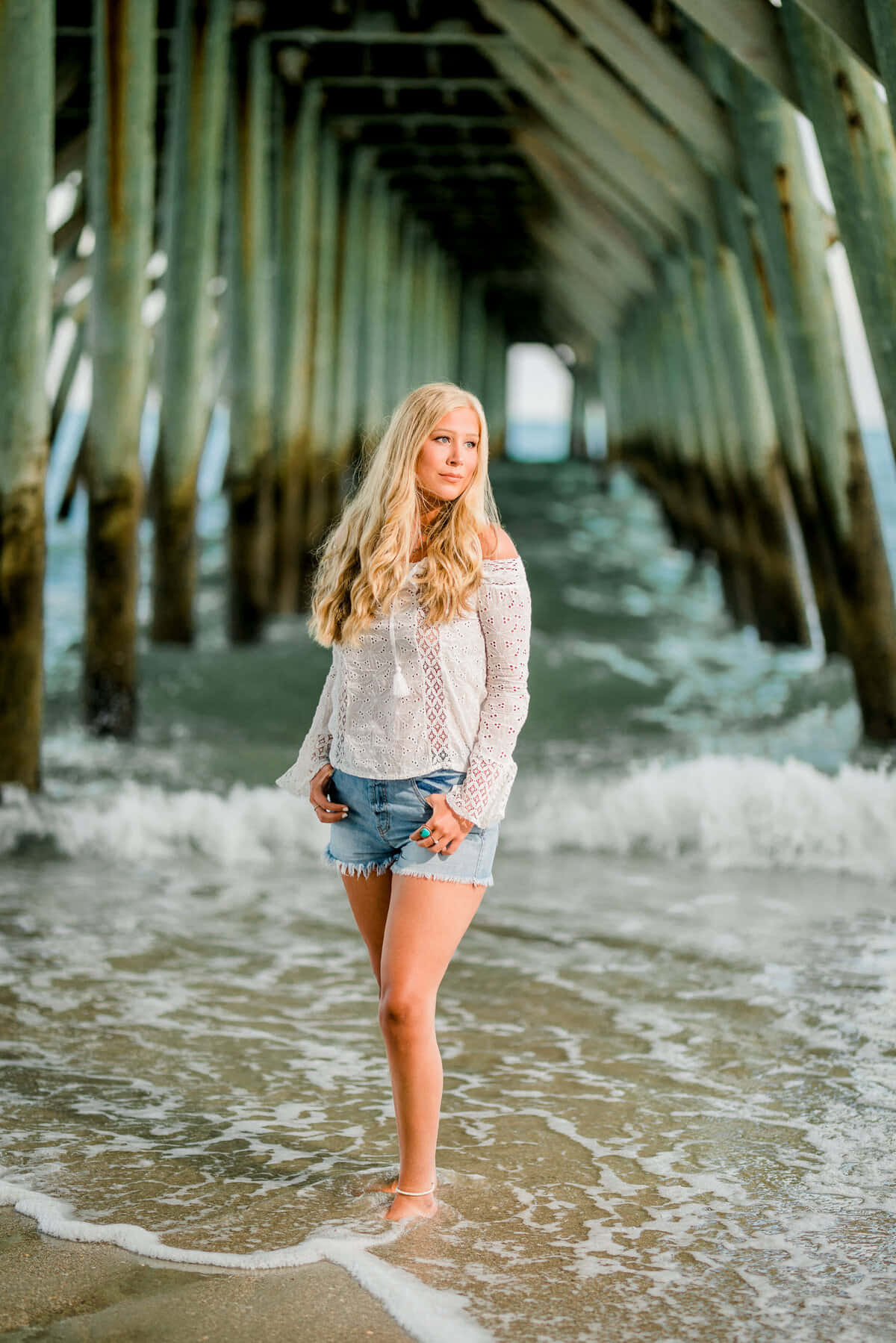 Senior Blonde Girl Under Pier Beach Pictures