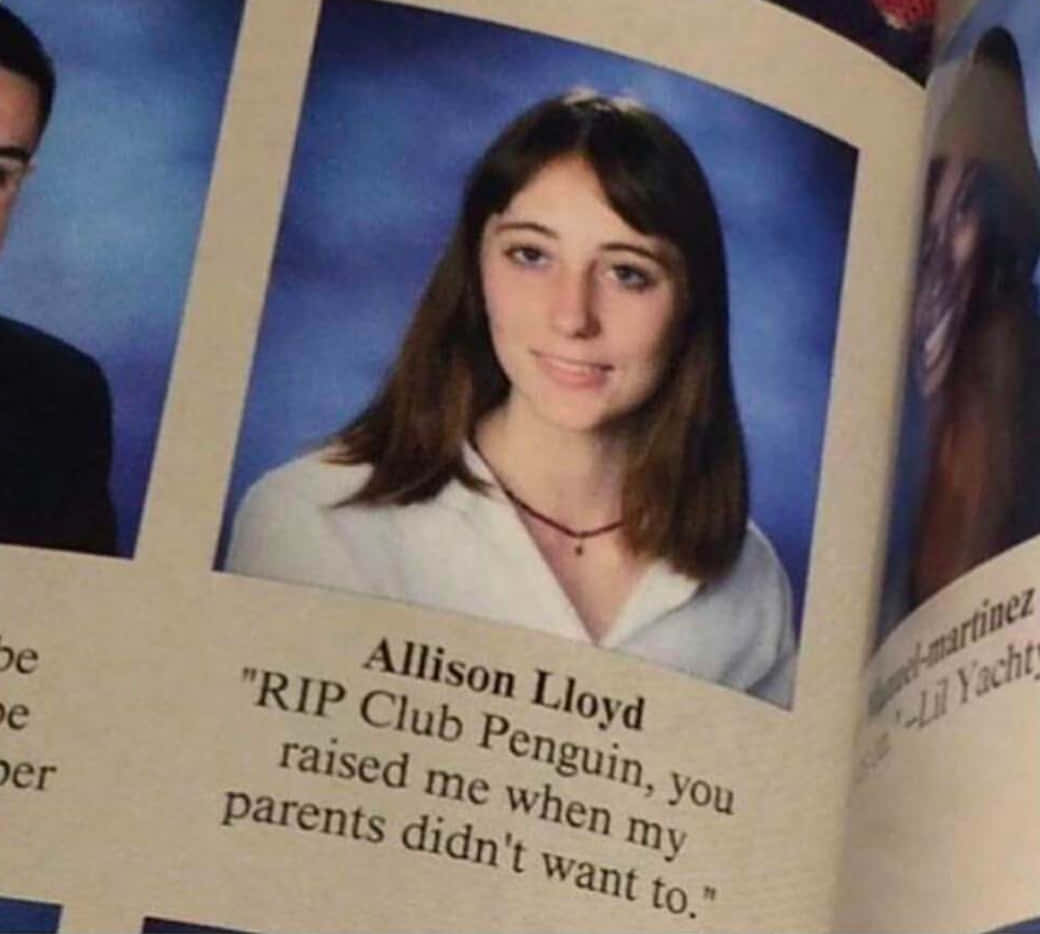 Et foto af et gymnasieårbog med et billede af en pingvin på det.
