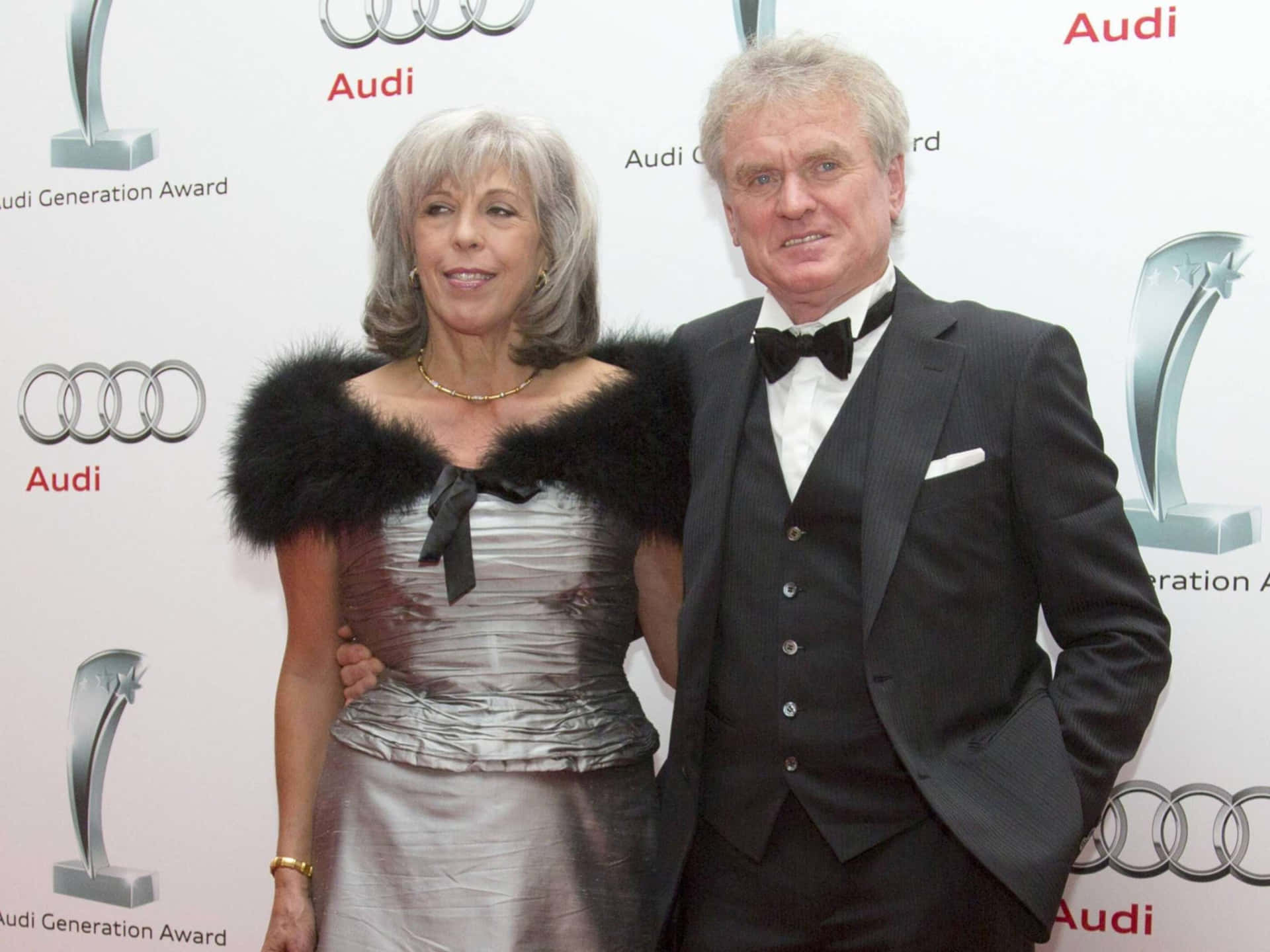 Sepp Maier And Wife Monika Roth At Audi Generation Award Event Wallpaper