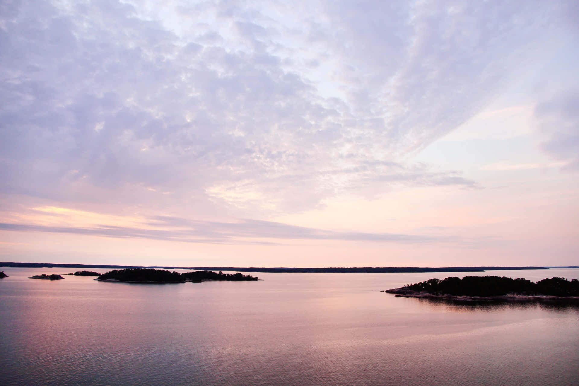Serene Archipelago Sunset Wallpaper