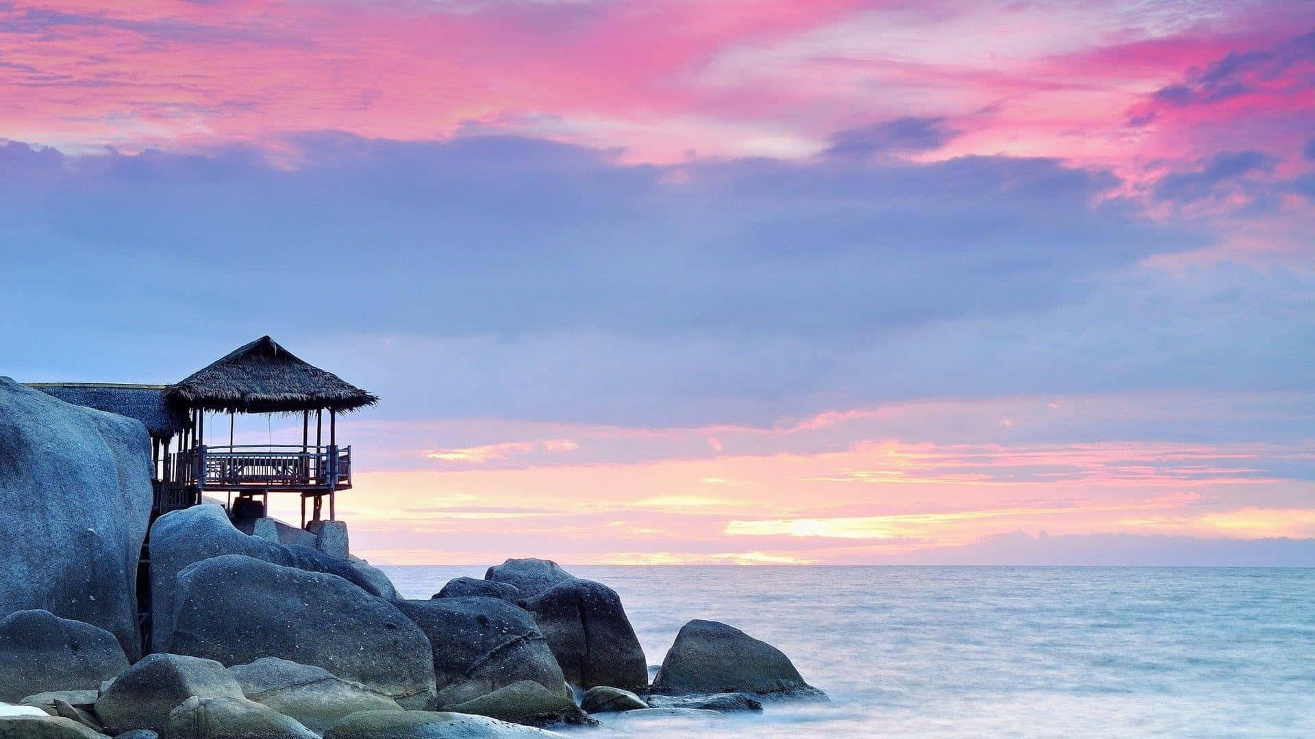 Serene Beach Sunset Hut Wallpaper