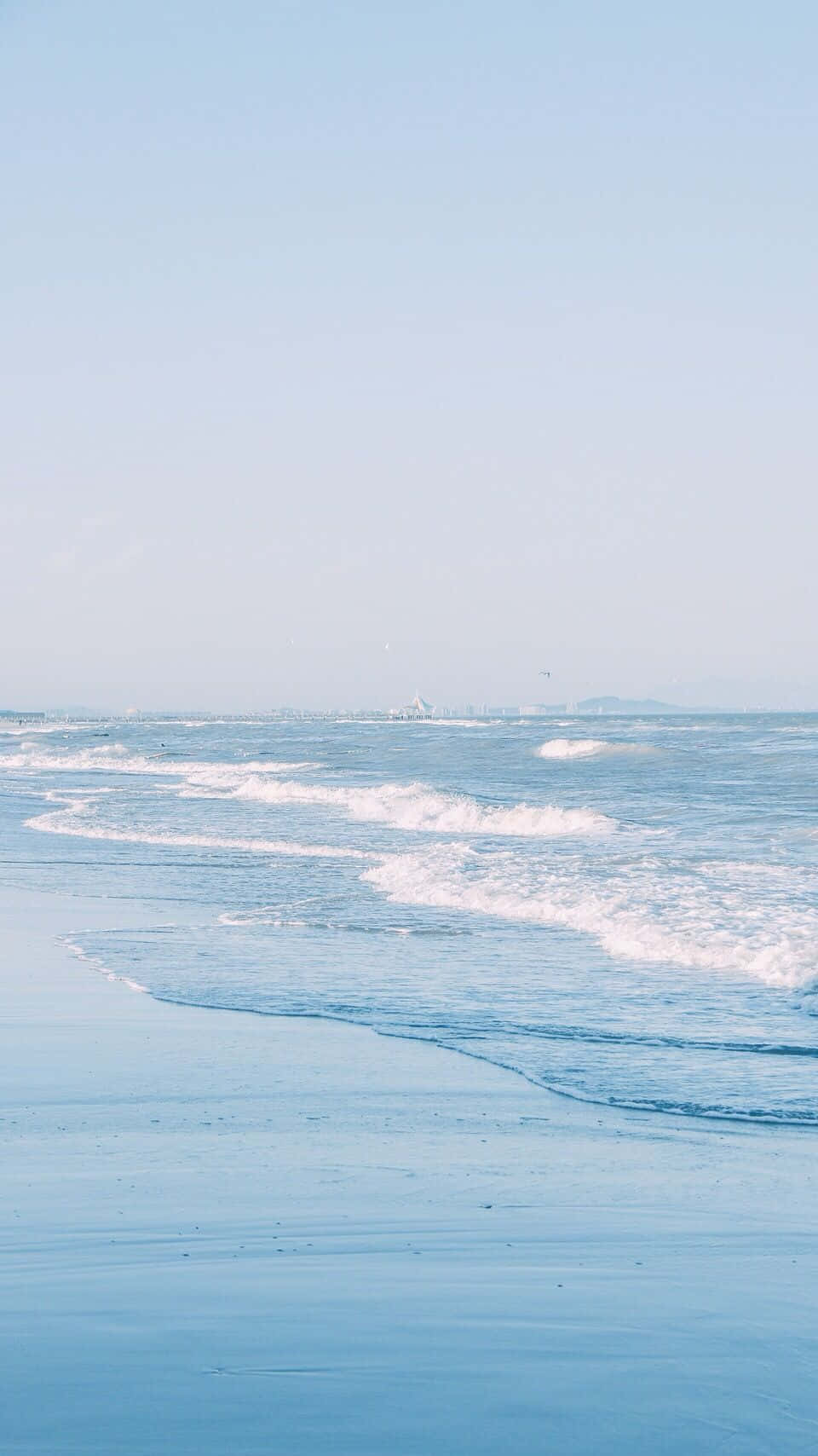 Serene Blue Beach Waves Wallpaper