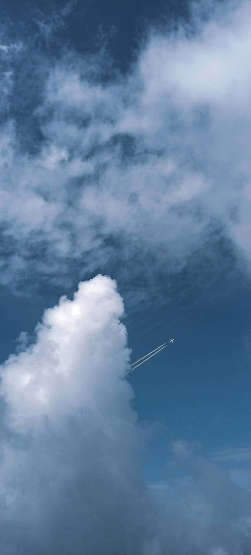 Serene_ Blue_ Sky_with_ Airplane Wallpaper